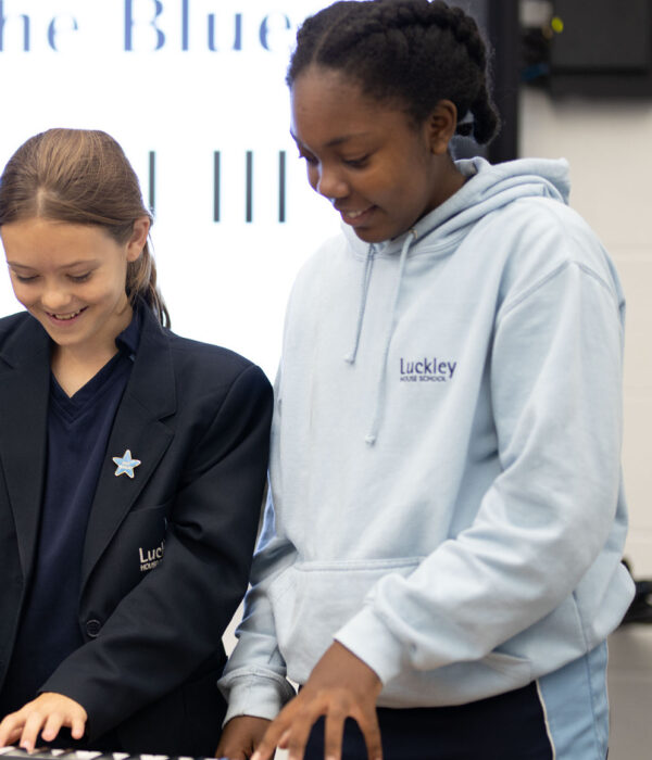 students playing the piano