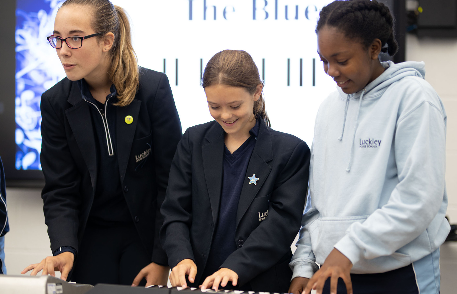 students playing the piano