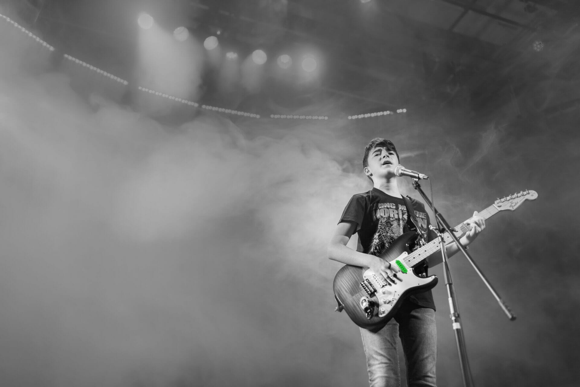 child playing the guitar