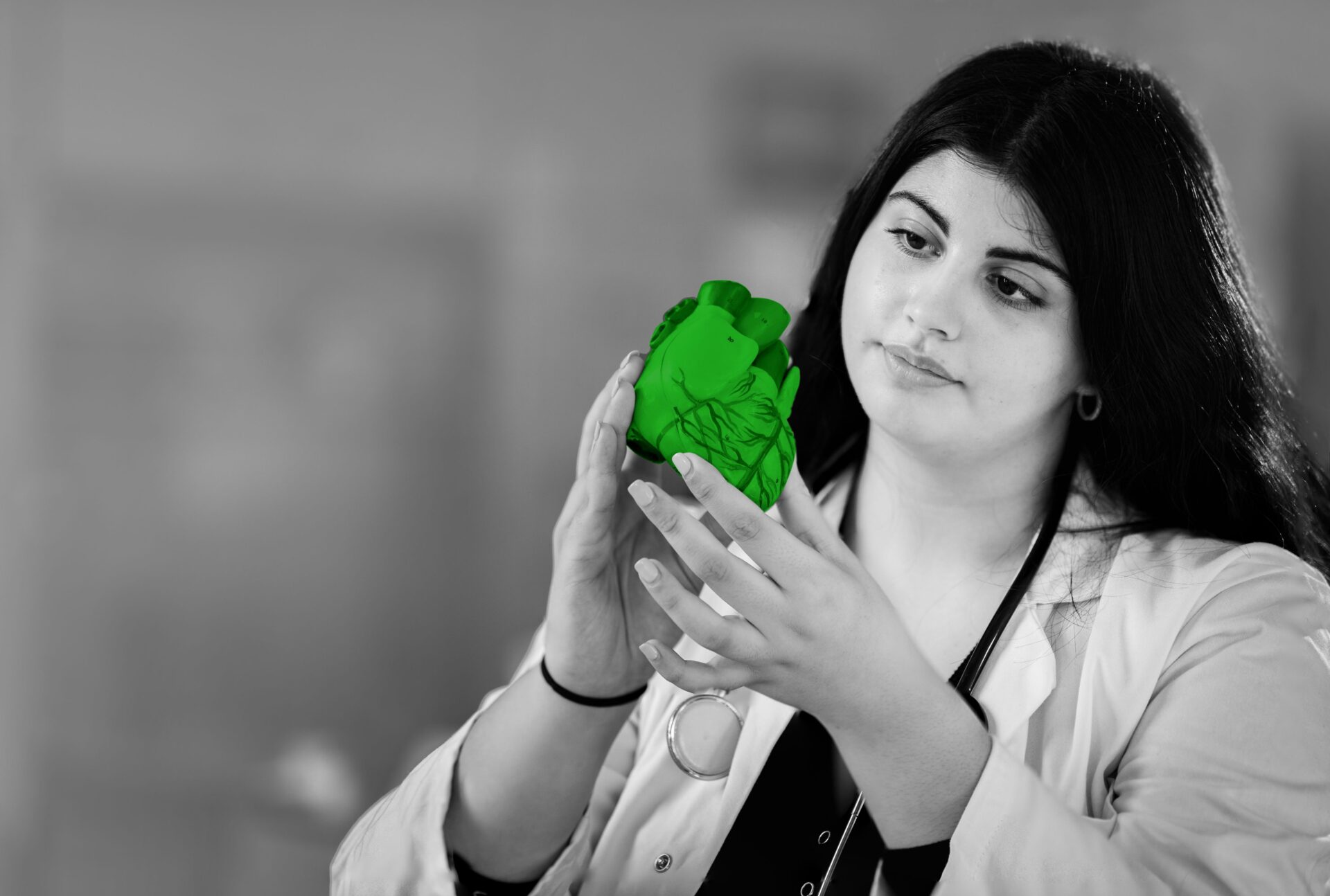 student looking at a green heart