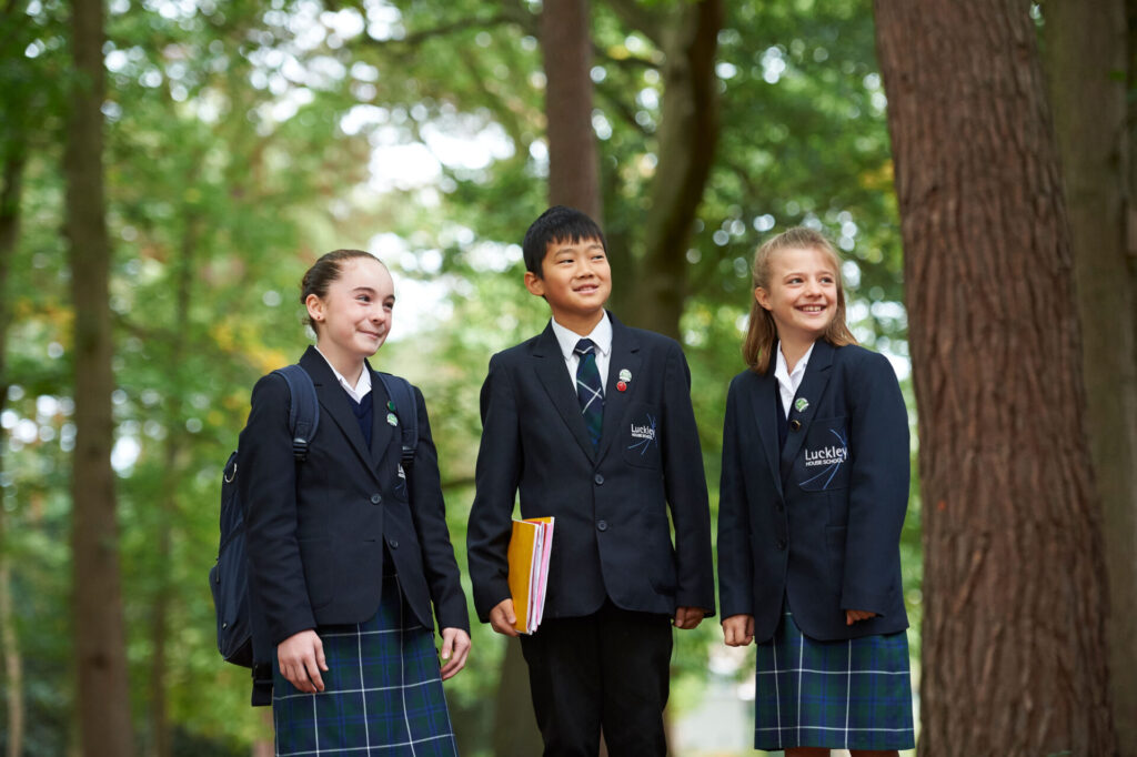 3 students in the forest