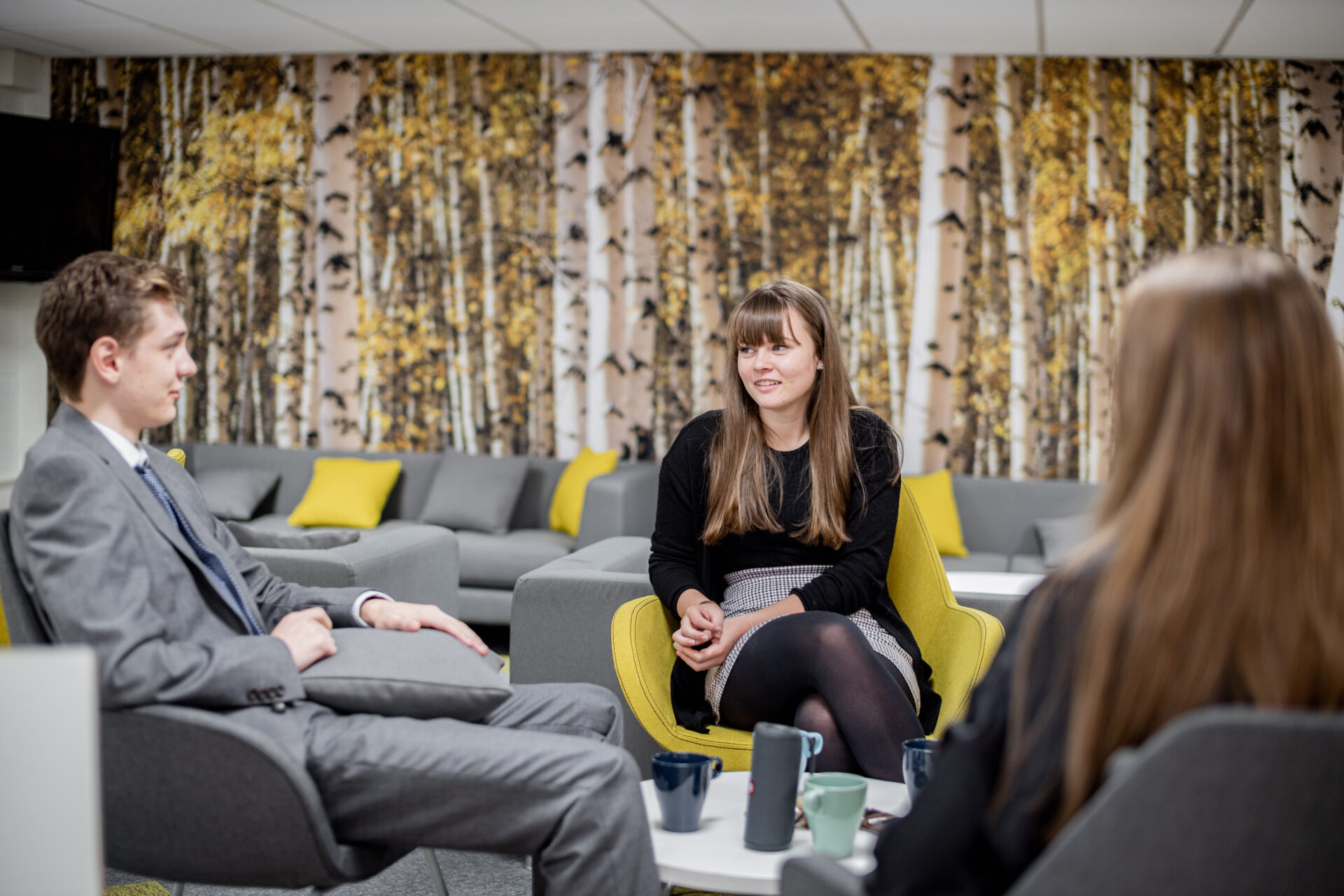 students talking in the common room