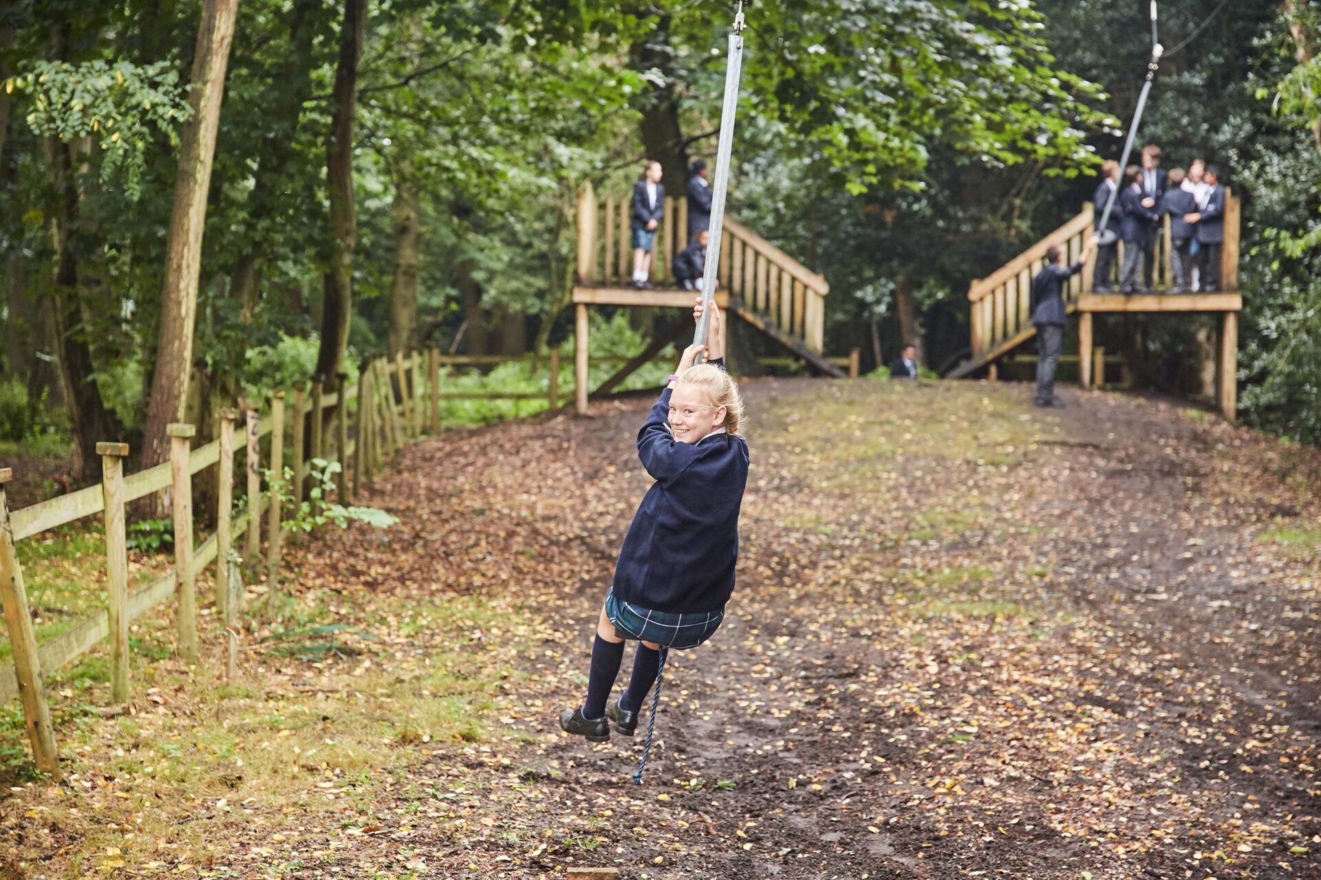 student on a zip wire