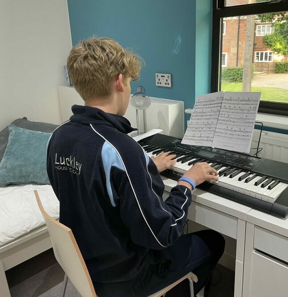 Archie playing the piano