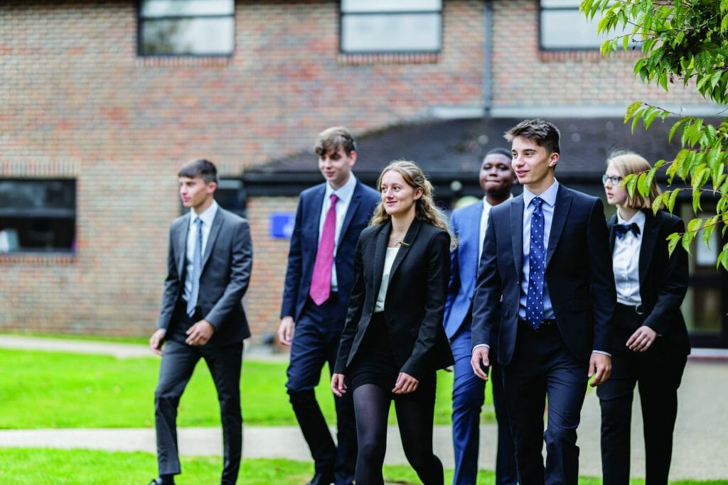 students in smart dress walking