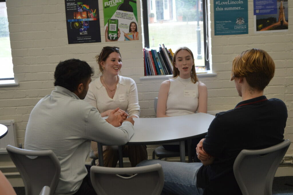 students sitting around a table