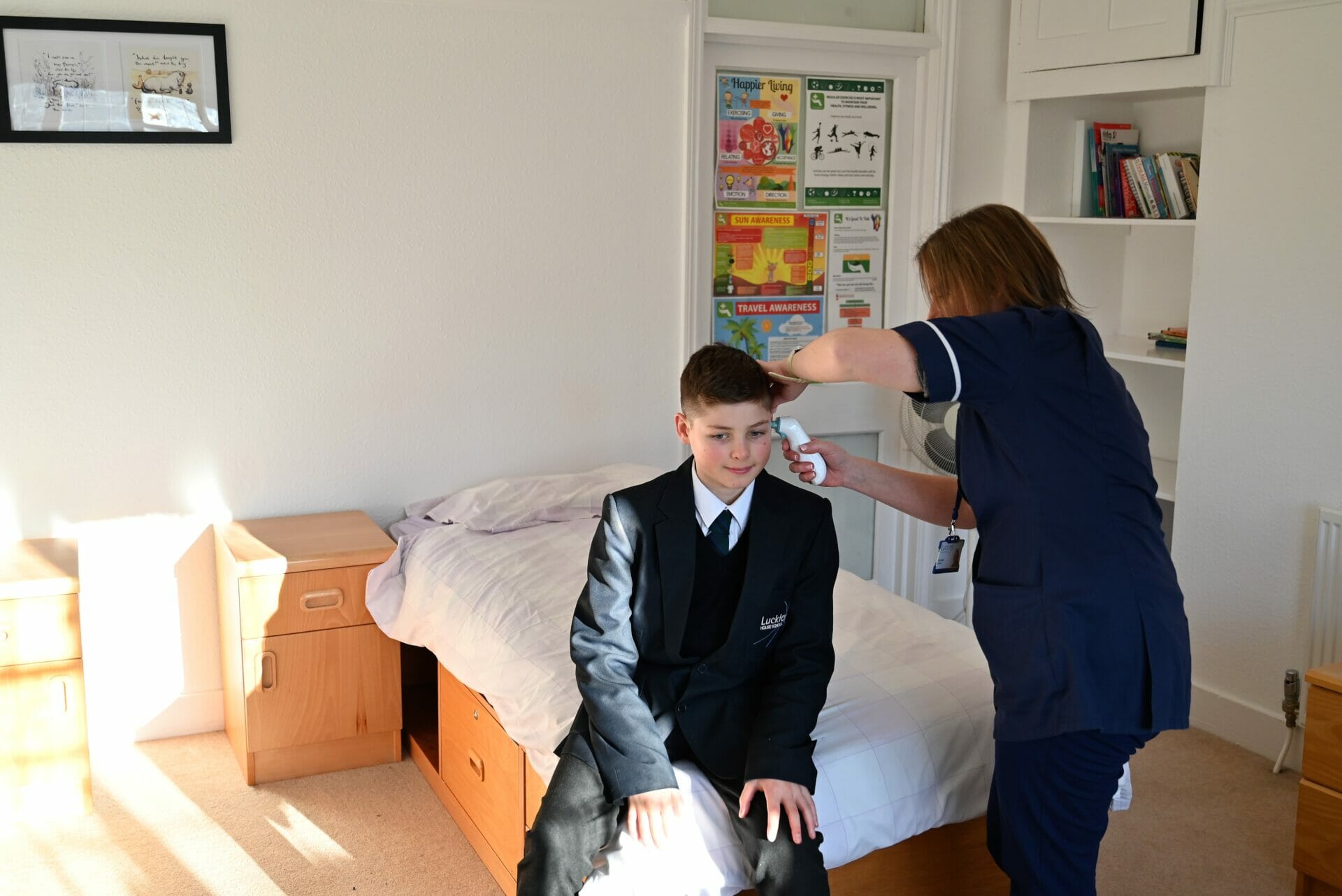 boy having his hair shaved