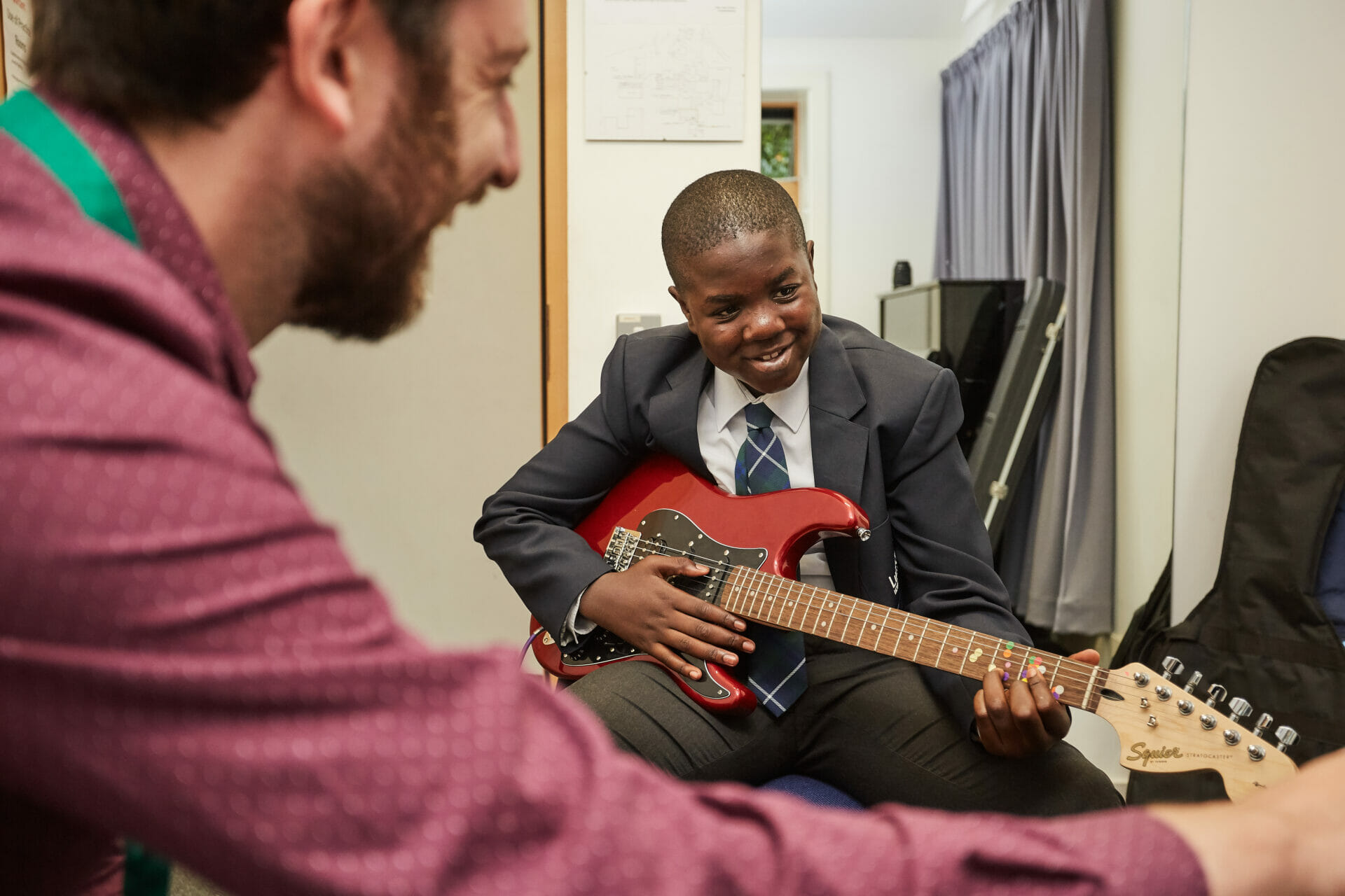 boy playing guitar