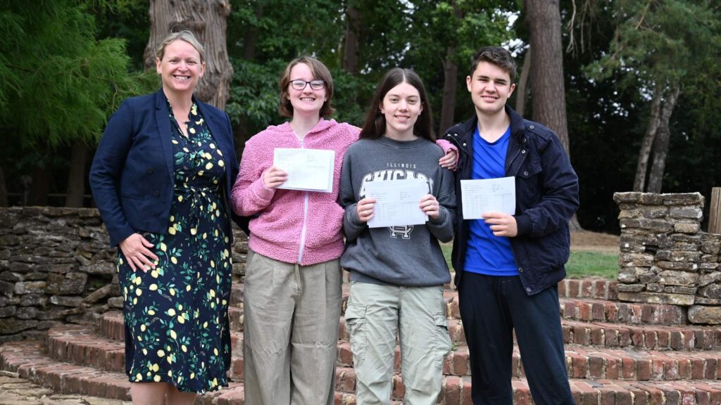 Interim-head-mrs-gilding-brant-celebrating-exam-results-with-pupils